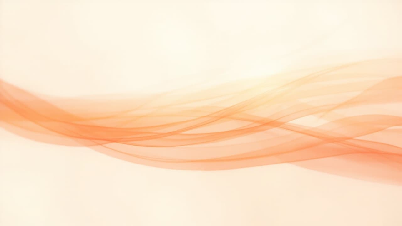 Abstract artwork of amber ribbons of light fanning open across the frame